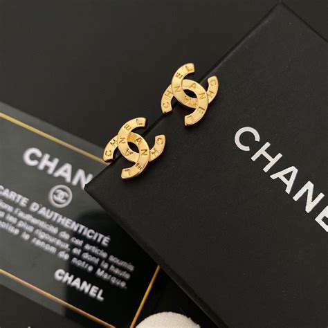 aretes chanel letras precio|More.